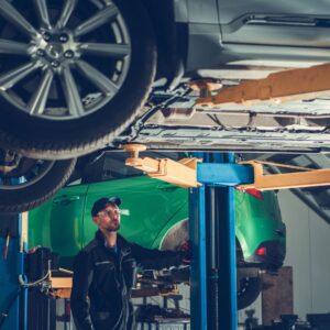 worker using a car lift