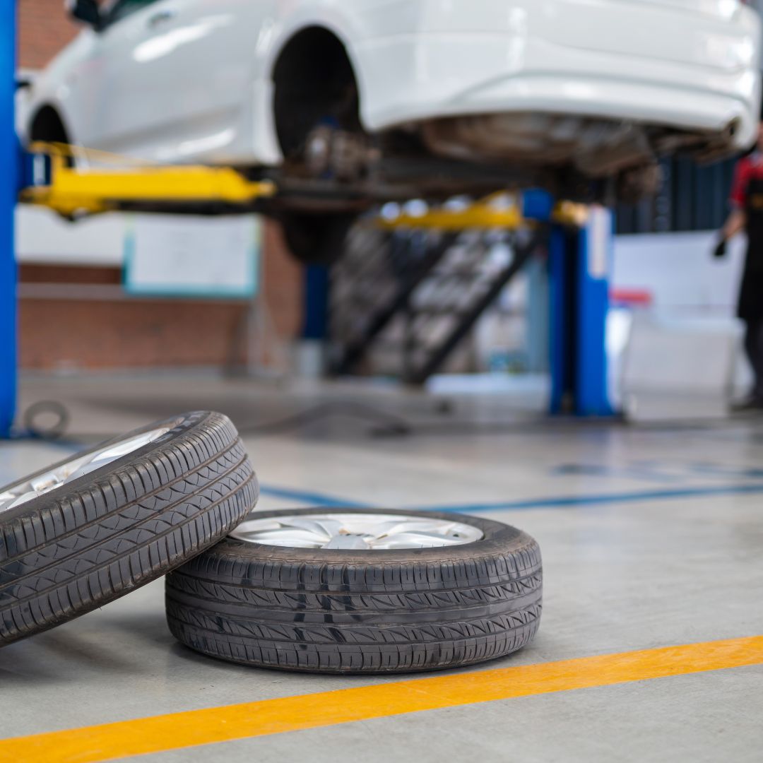tires resting on epoxy flooring in garage