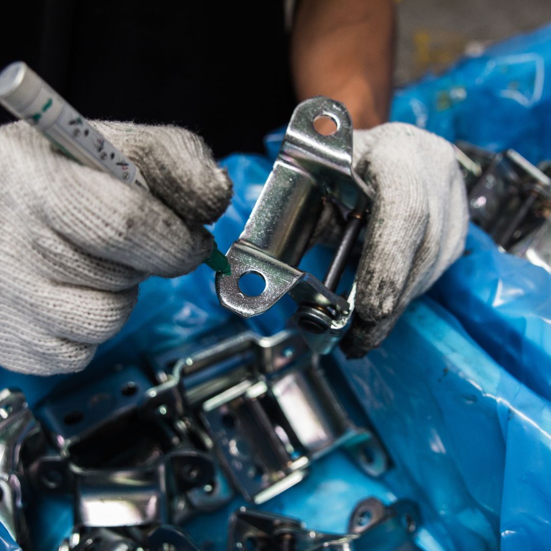 mechanic holding tools