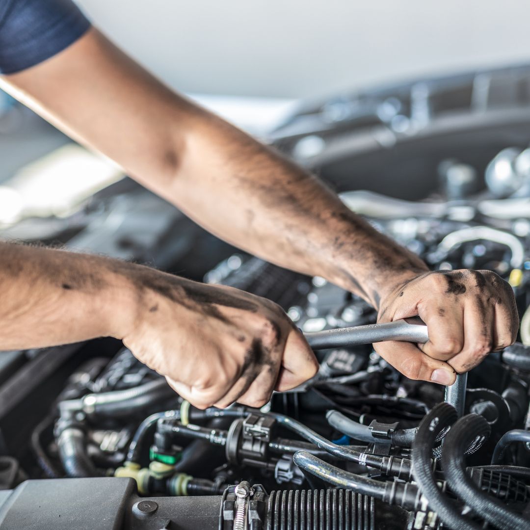 mechanic working on a car